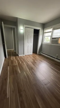 a view of an empty room and window