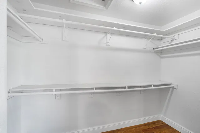 a view of a room with racks on the wall