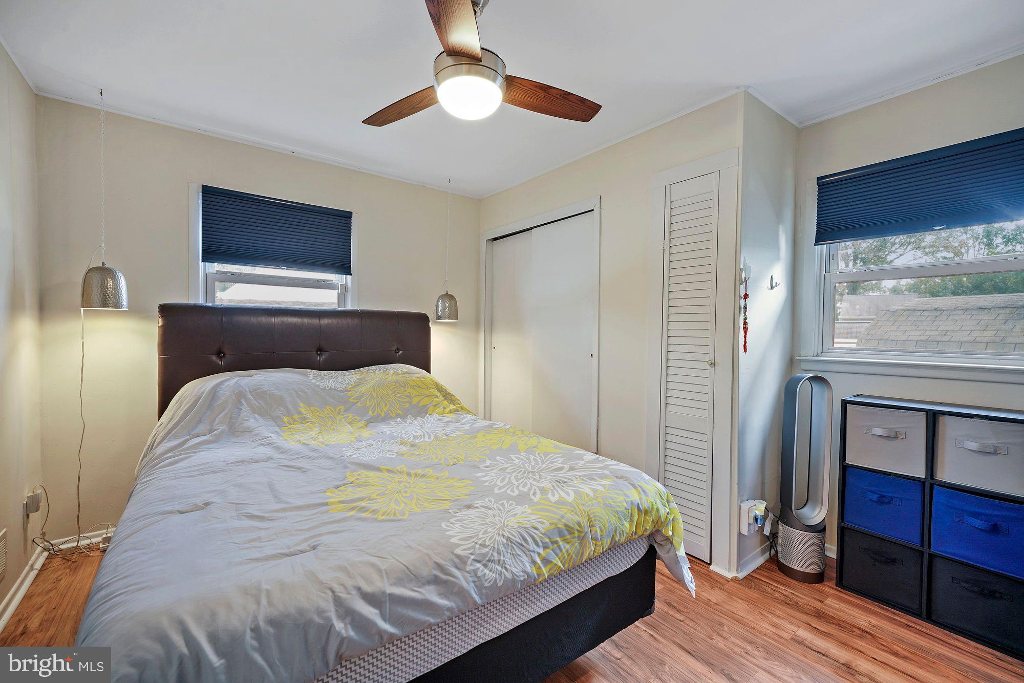 3 Albemarle Road Hamilton, NJ 08690 - Photo 21 of 27 a bedroom with a bed and a chandelier