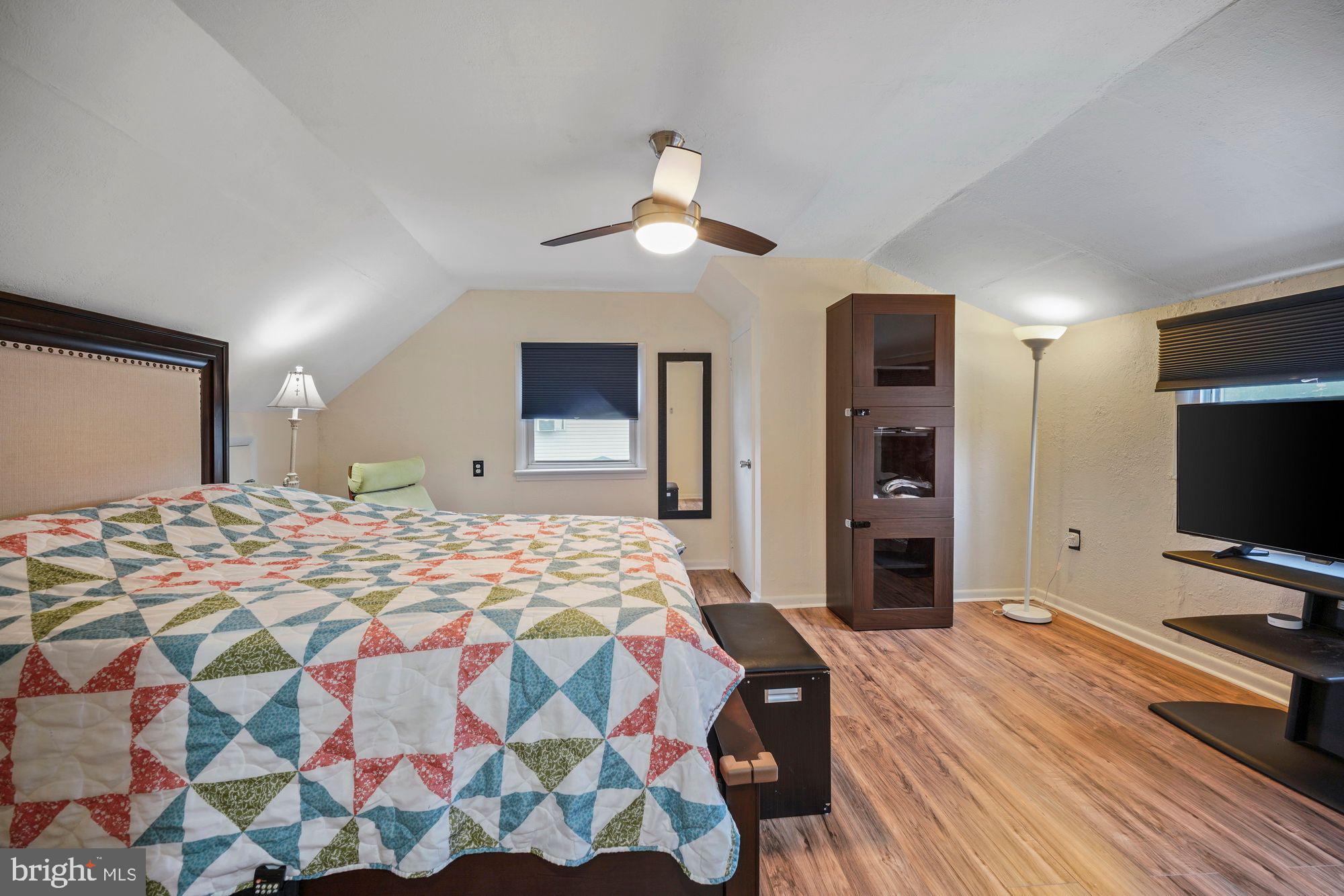 3 Albemarle Road Hamilton, NJ 08690 - Photo 22 of 27 a bedroom with a bed and a flat screen tv
