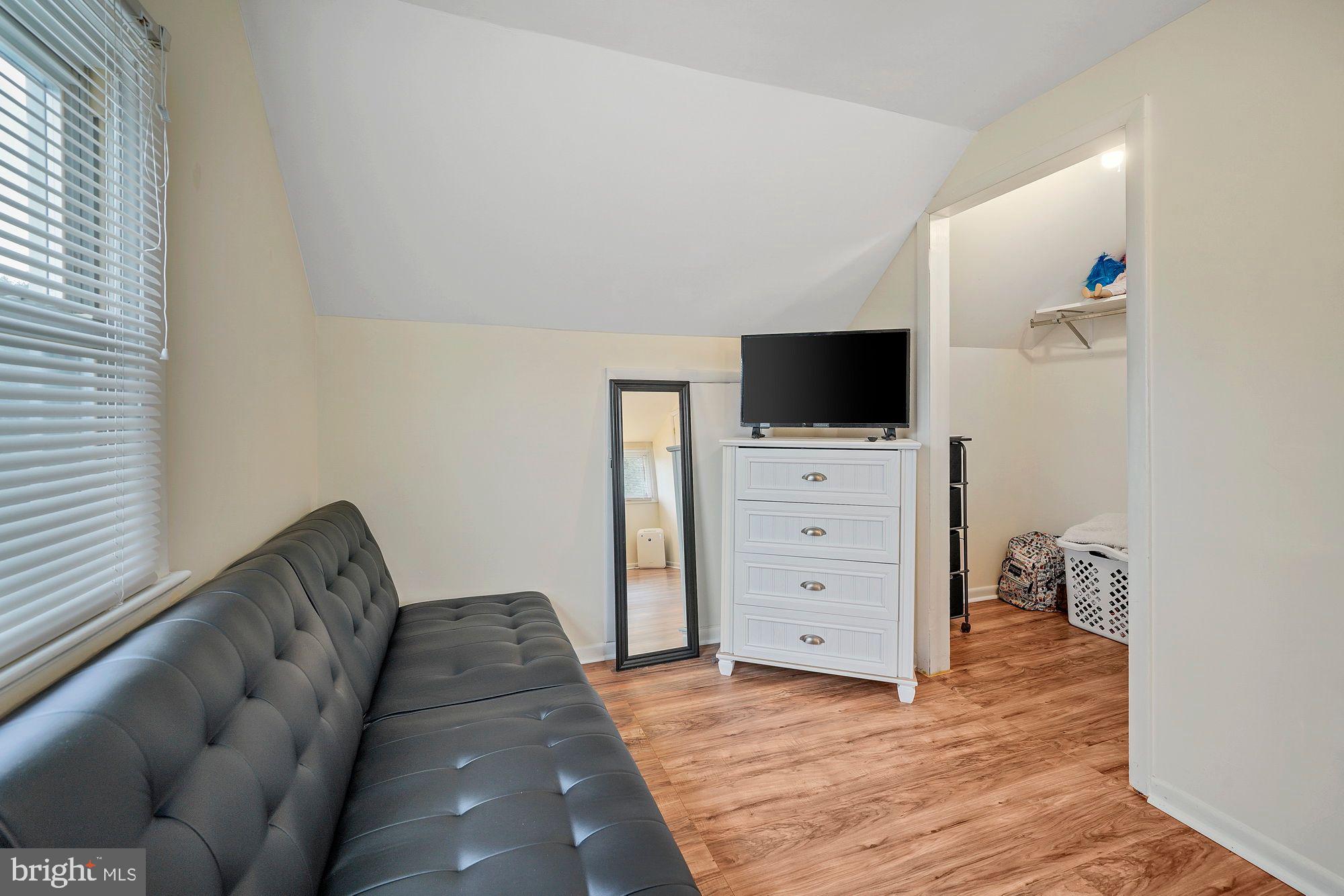 3 Albemarle Road Hamilton, NJ 08690 - Photo 25 of 27 a living room with furniture and a flat screen tv