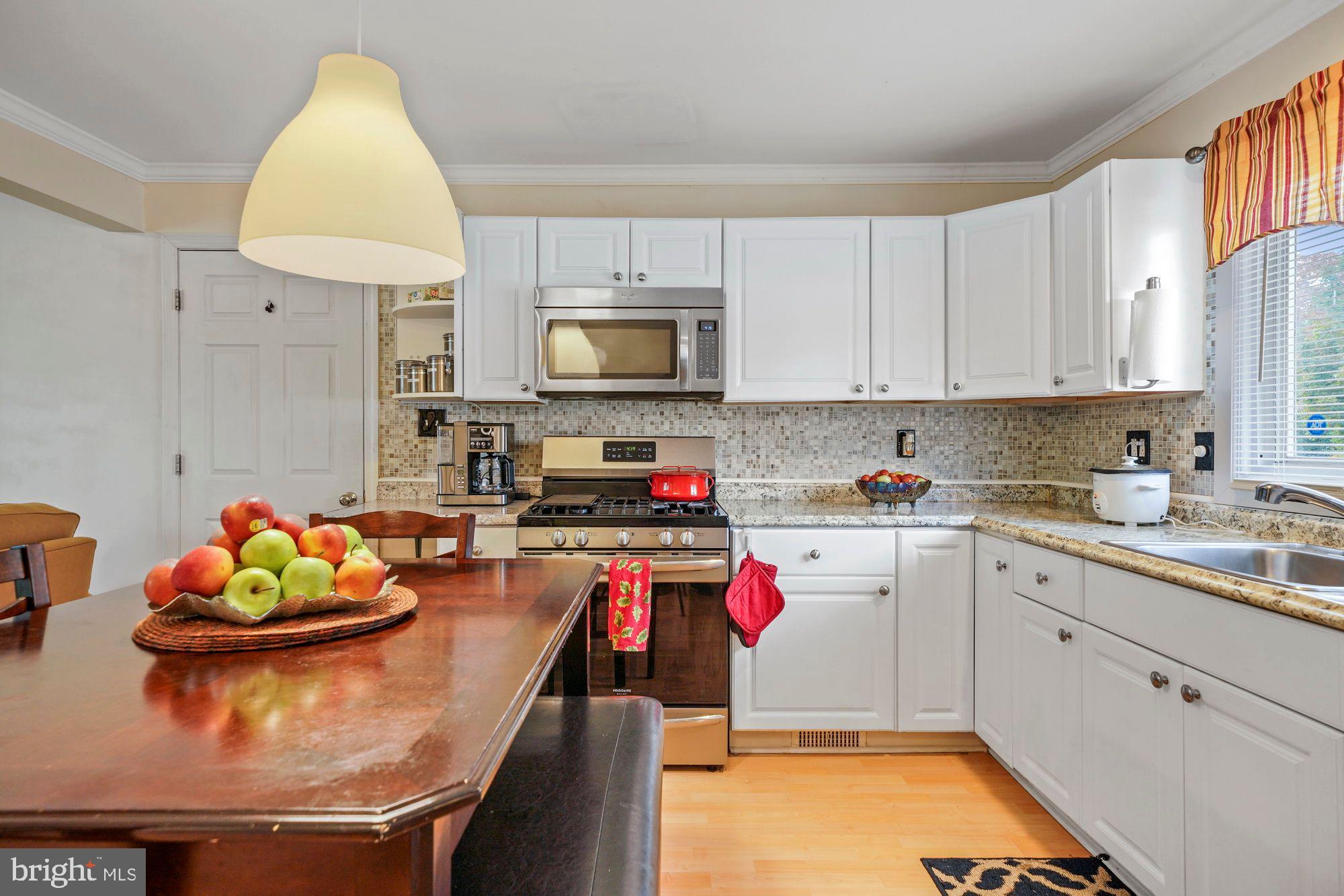 3 Albemarle Road Hamilton, NJ 08690 - Photo 4 of 27 a kitchen with a sink appliances and cabinets