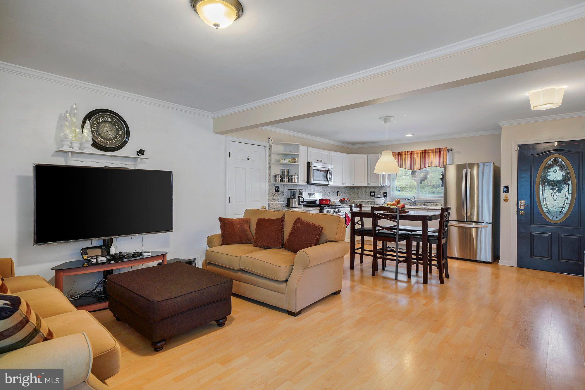 3 Albemarle Road Hamilton, NJ 08690 - Photo 6 of 27 a living room with furniture and a flat screen tv