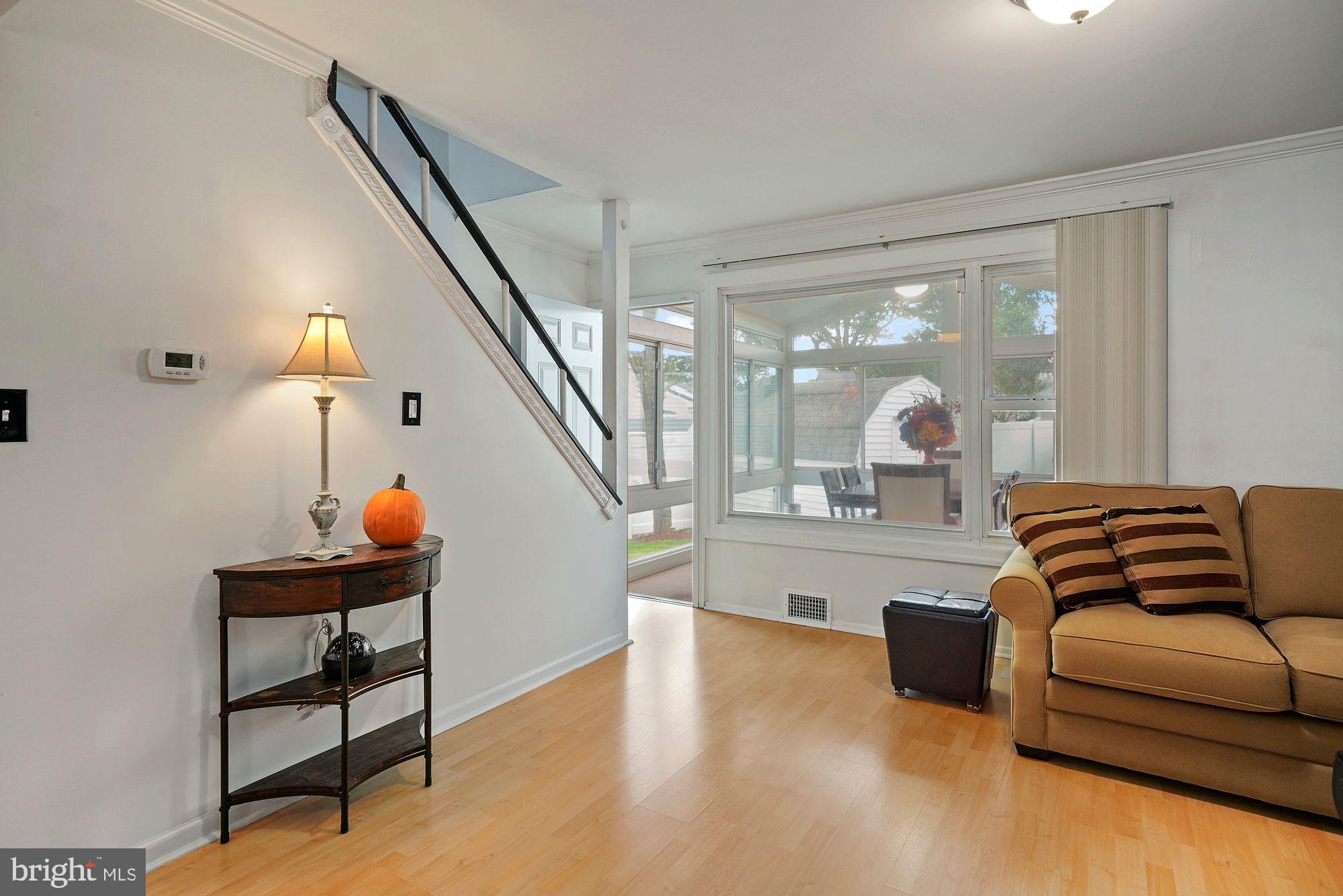 3 Albemarle Road Hamilton, NJ 08690 - Photo 8 of 27 a living room with furniture and a potted plant