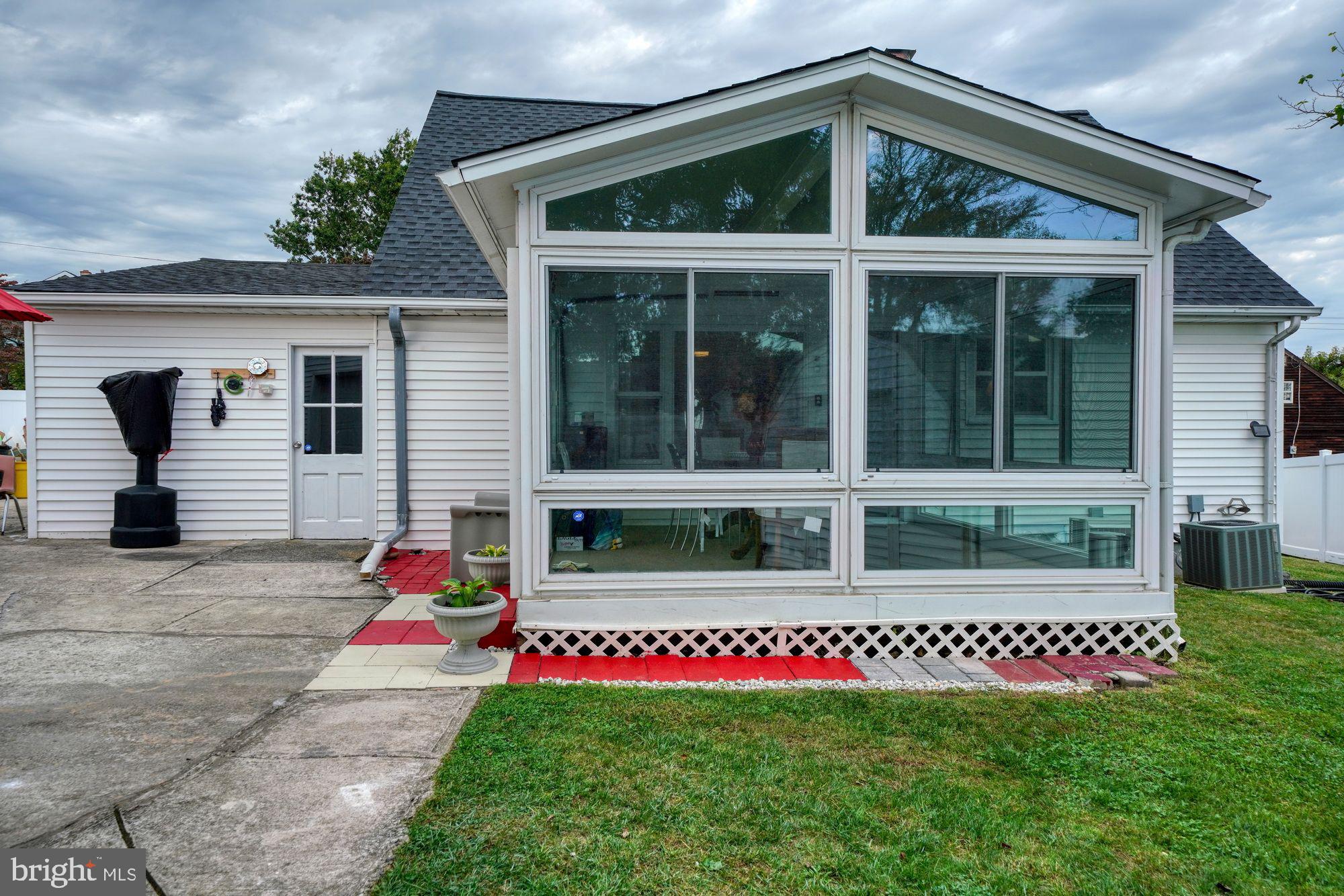 3 Albemarle Road Hamilton, NJ 08690 - Photo 9 of 27 a view of a house with a yard and garage