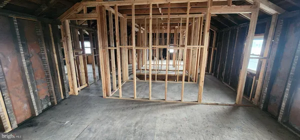 a view of a porch with wooden floor and stairs