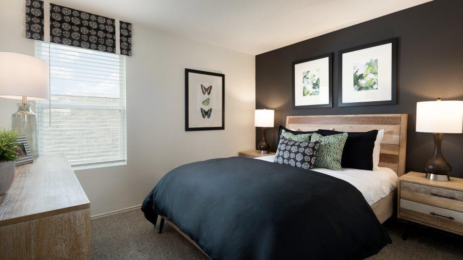 118 Meuse Lane Kyle, TX 78640 - Photo 12 of 13 a bedroom with a large bed and a window