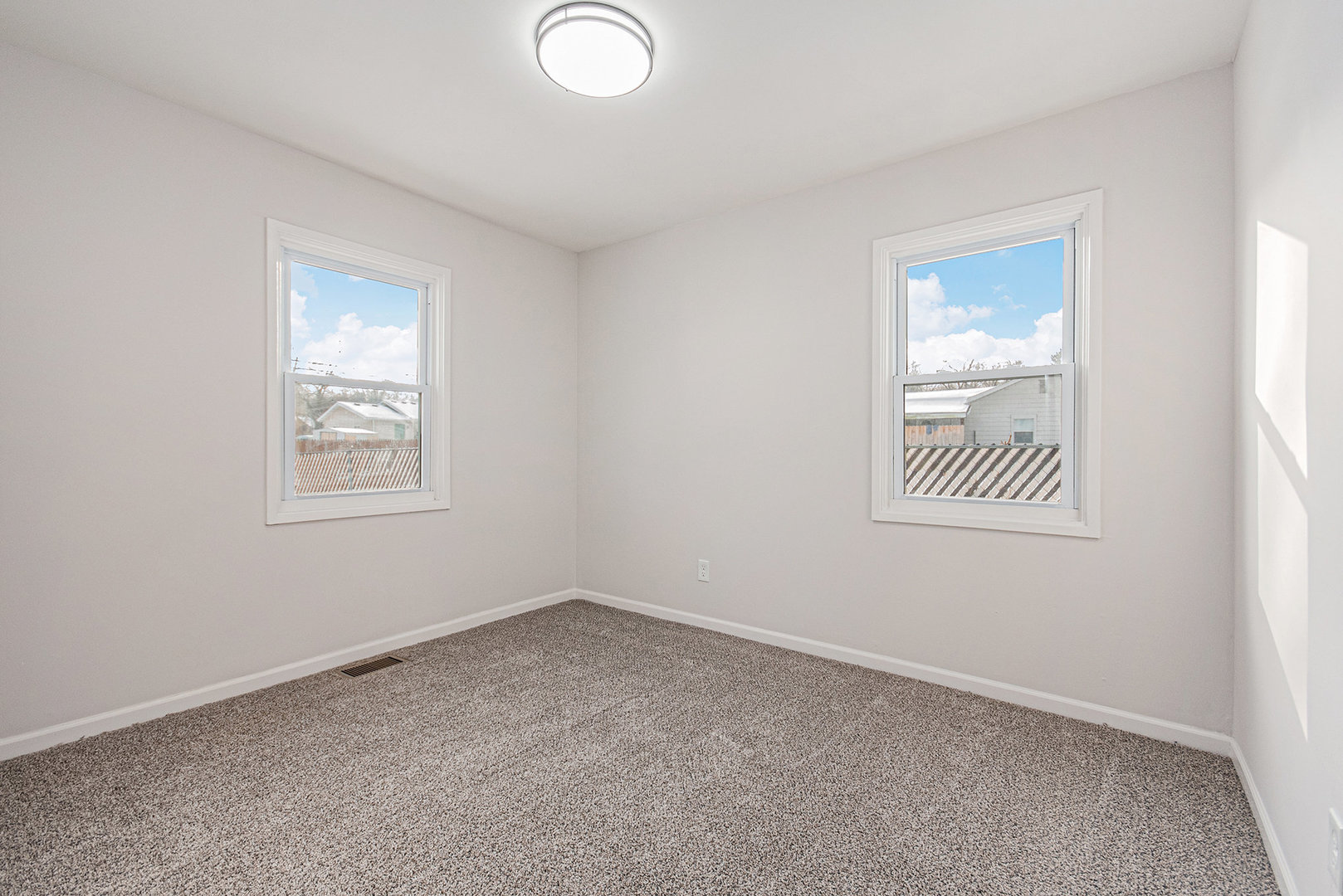 512 Sehring Street Joliet, IL 60436 - Photo 8 of 15 an empty room with windows