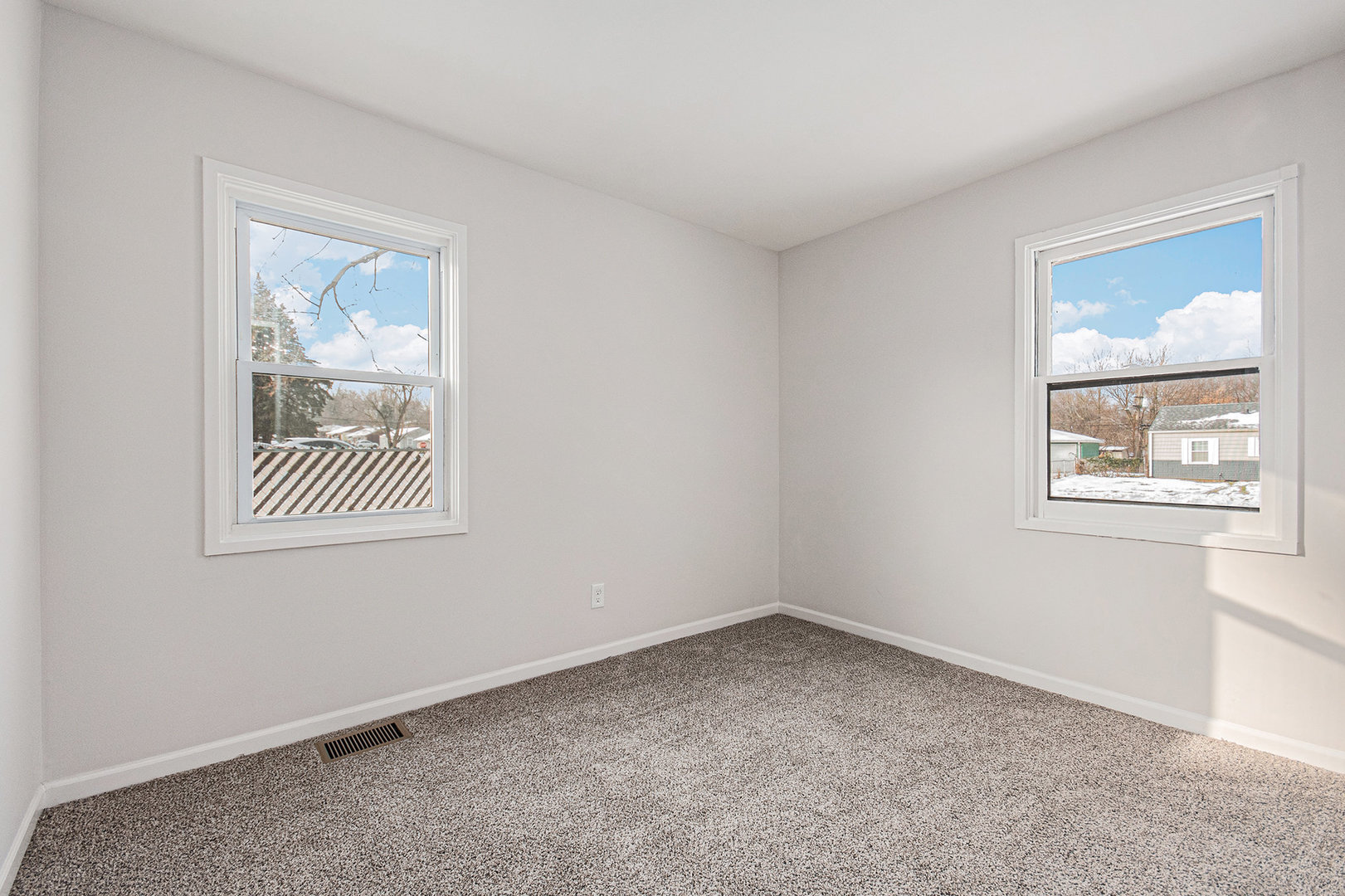 512 Sehring Street Joliet, IL 60436 - Photo 9 of 15 an empty room with windows