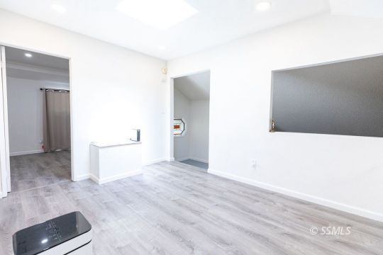 400 Tepatitlan Court Ridgecrest, CA 93555 - Photo 29 of 35 a view of a refrigerator in kitchen and an empty room