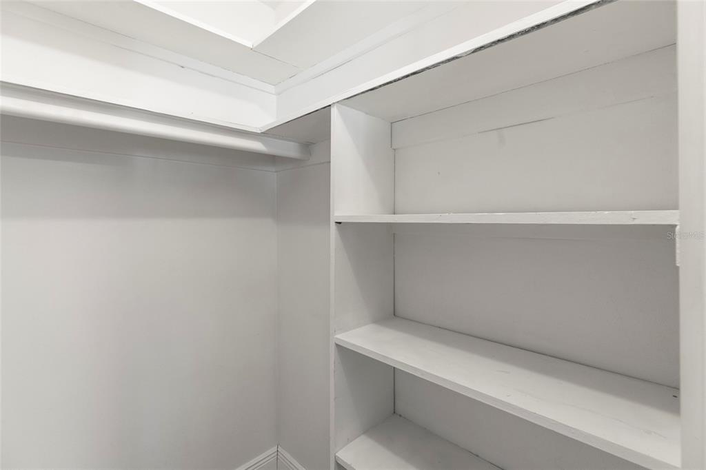 250 Rosery Road Northwest, Unit 314 Largo, FL 33770 - Photo 12 of 16 a view of an empty walk in closet
