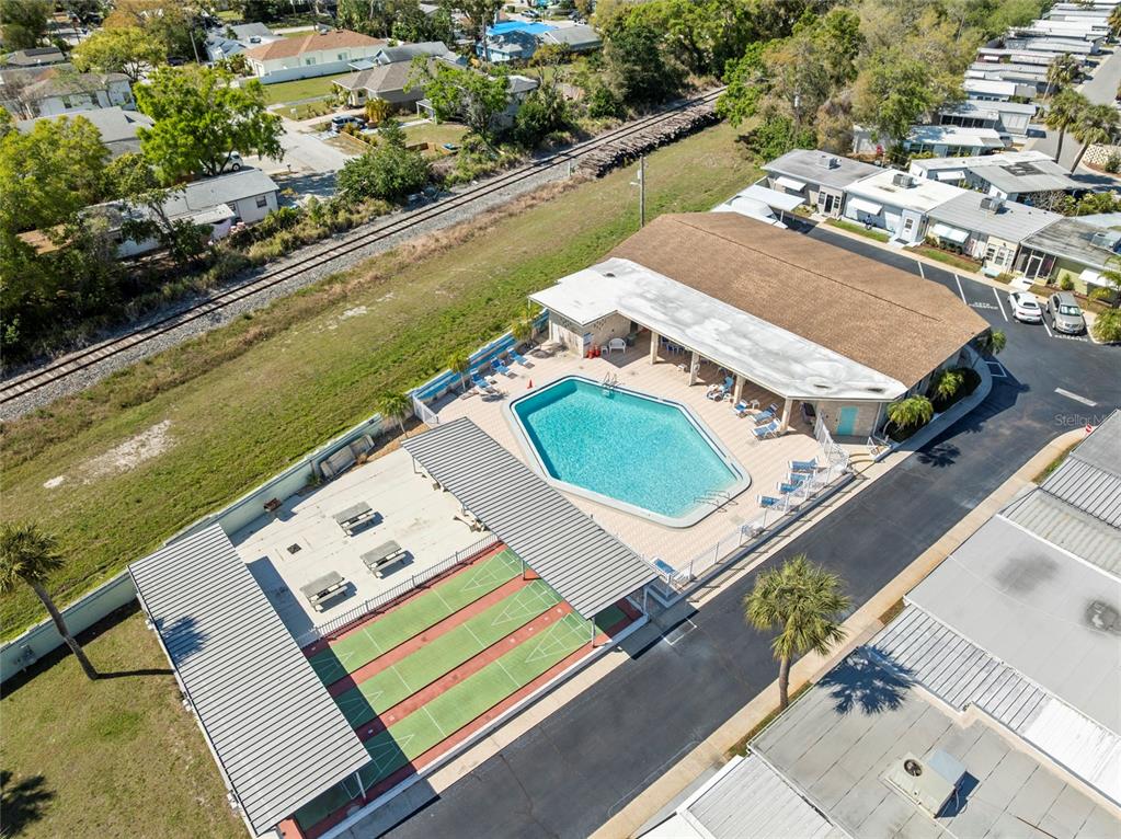 250 Rosery Road Northwest, Unit 314 Largo, FL 33770 - Photo 16 of 16 an aerial view of a house with a lake view
