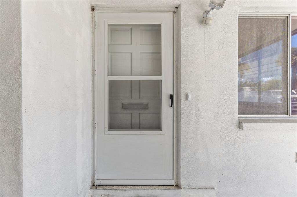 250 Rosery Road Northwest, Unit 314 Largo, FL 33770 - Photo 2 of 16 a view of a hallway with a small space