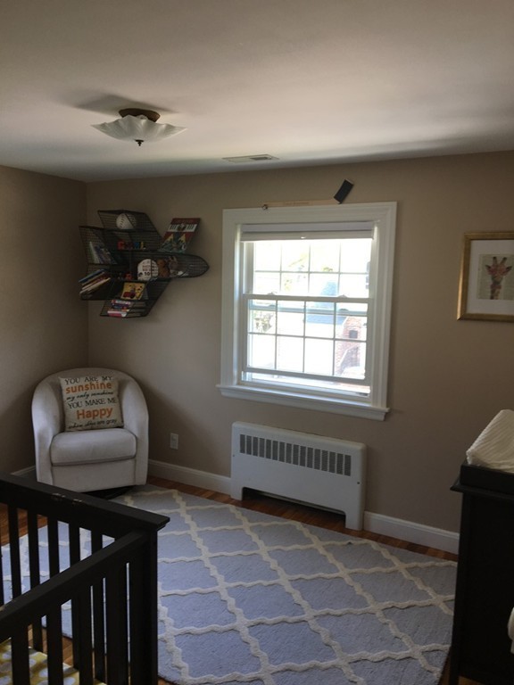 4 Latin Road Boston, MA 02132 - Photo 13 of 16 a view of a livingroom with furniture and a window