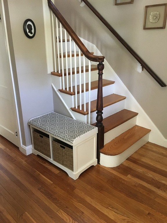 4 Latin Road Boston, MA 02132 - Photo 10 of 16 a view of entryway with wooden floor and stairs