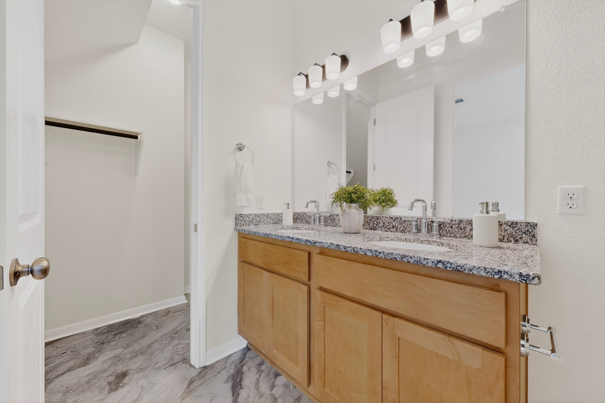 2308 Mondello Path Leander, TX 78641 - Photo 20 of 39 Double vanity with granite counters and expansive mirror.