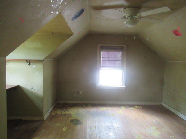 211 South Lafayette Street Byron, IL 61010 - Photo 15 of 26 an empty room with windows and fan
