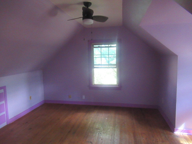 211 South Lafayette Street Byron, IL 61010 - Photo 18 of 26 an empty room with a window