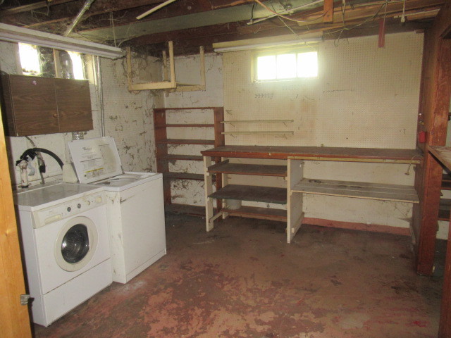 211 South Lafayette Street Byron, IL 61010 - Photo 22 of 26 a utility room with dryer and washer