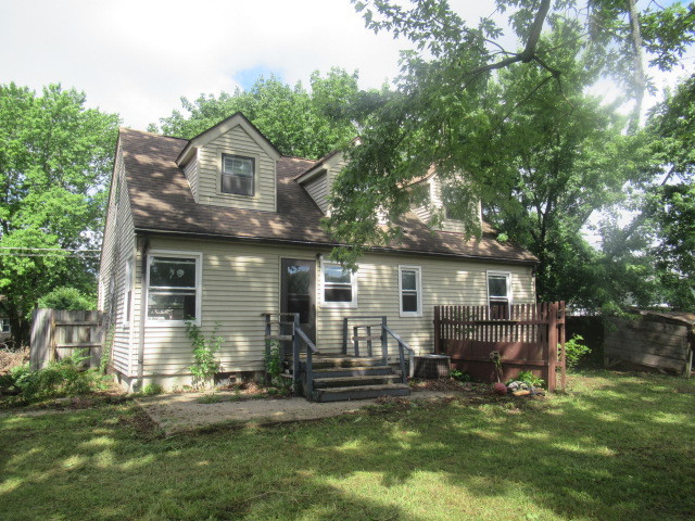 211 South Lafayette Street Byron, IL 61010 - Photo 24 of 26 a view of house with backyard