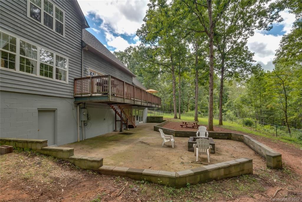 220 Collins Road Forest City, NC 28043 - Photo 3 of 24 a view of a house with backyard