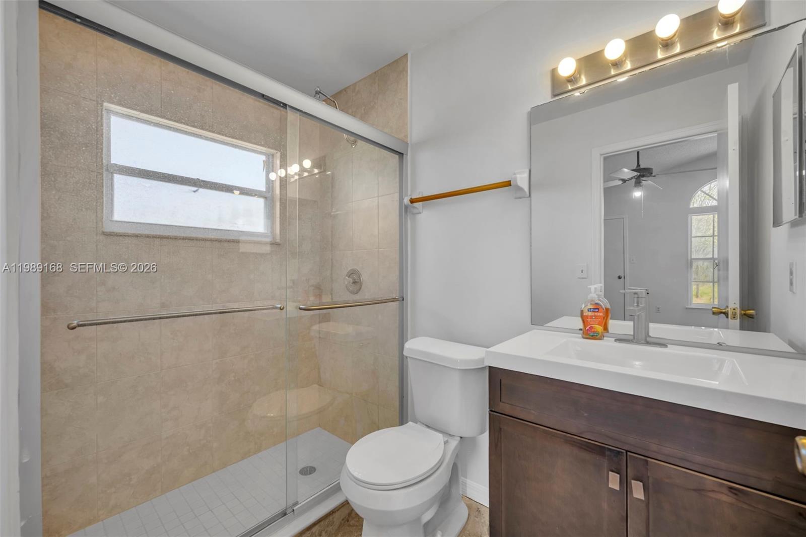 331 San Gabriel Street Winter Springs, FL 32708 - Photo 16 of 26 a bathroom with a sink toilet and shower