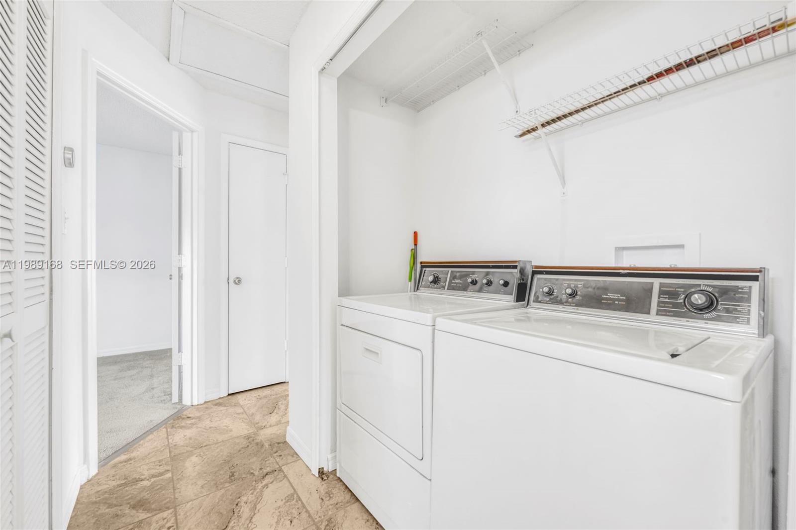 331 San Gabriel Street Winter Springs, FL 32708 - Photo 20 of 26 a utility room with dryer and washer