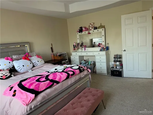 a bedroom with a bed and closet