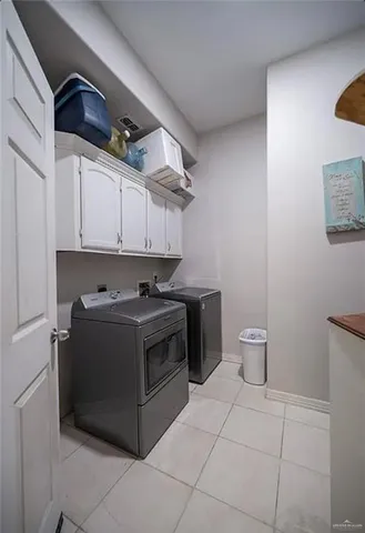 a view of a stove top oven and cabinets