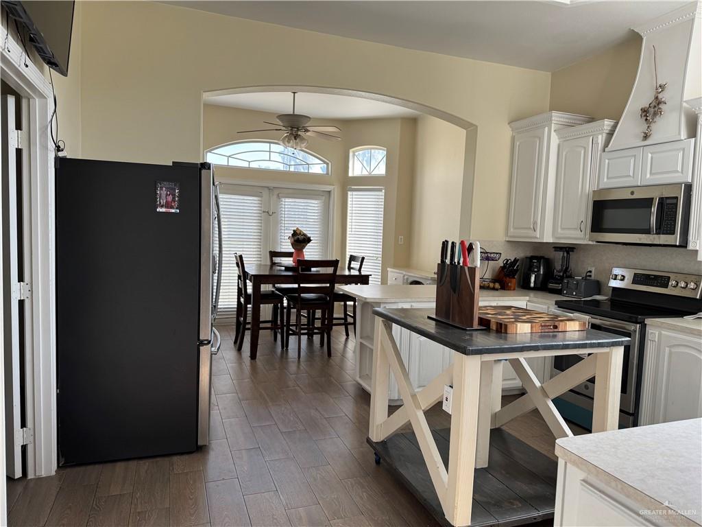 2600 Rhett Drive Pharr, TX 78577 - Photo 4 of 21 a view of a dining room with furniture and a chandelier