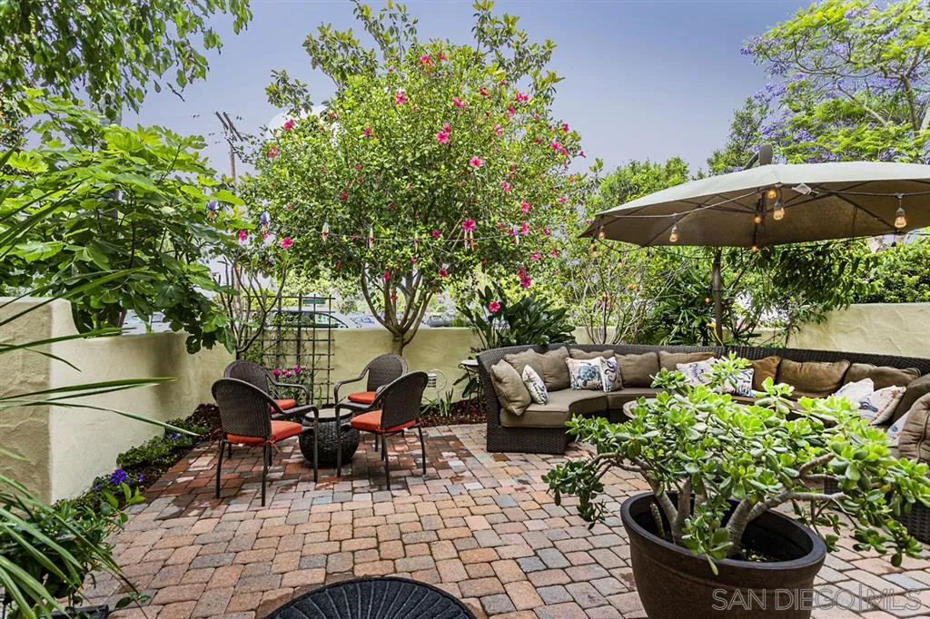 930 10th Street Coronado, CA 92118 - Photo 17 of 25 a view of a patio with couches and potted plants