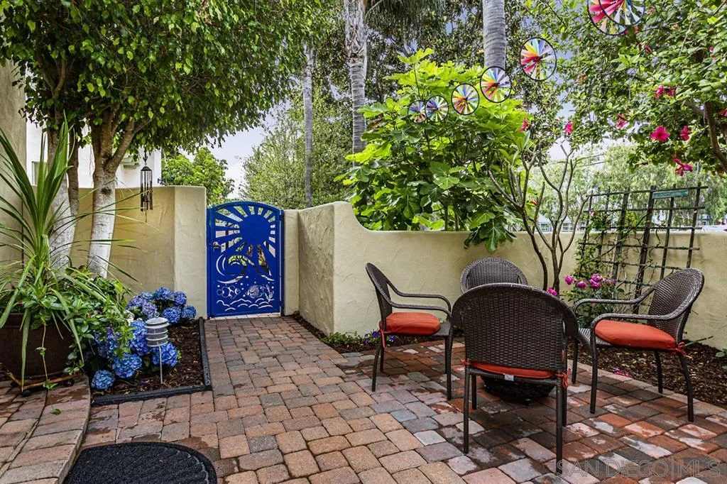930 10th Street Coronado, CA 92118 - Photo 19 of 25 an outdoor sitting area with furniture and garden