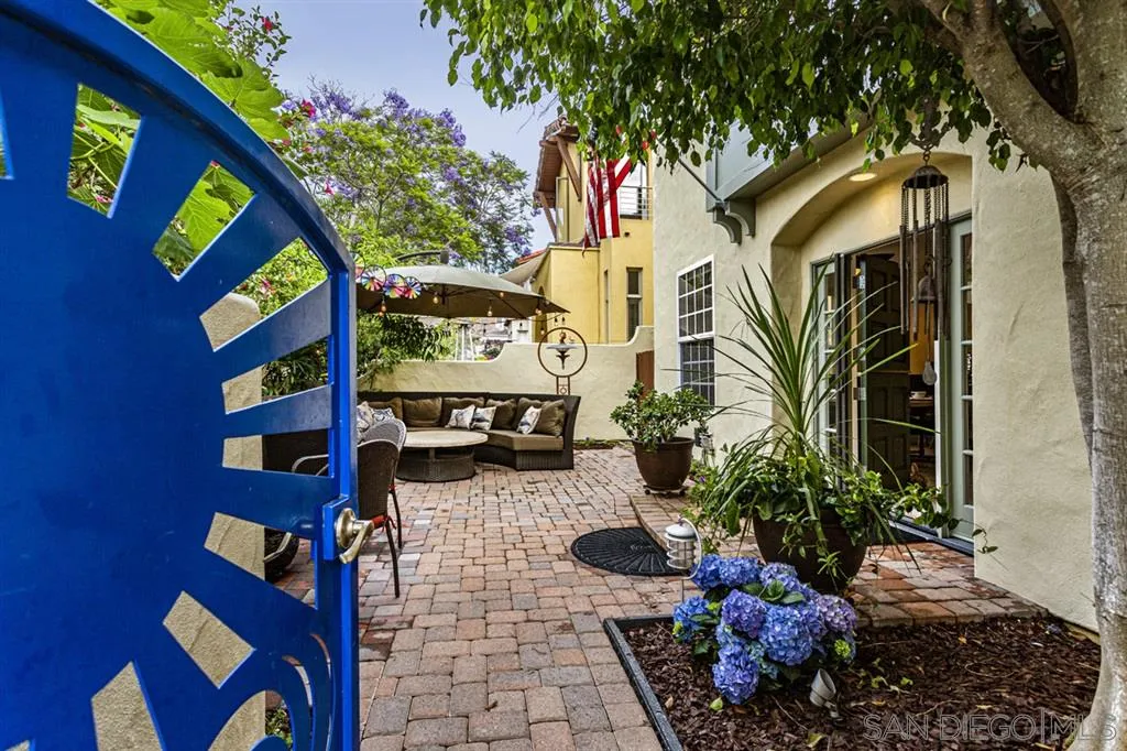 930 10th Street Coronado, CA 92118 - Photo 20 of 25 a front view of a house with a yard