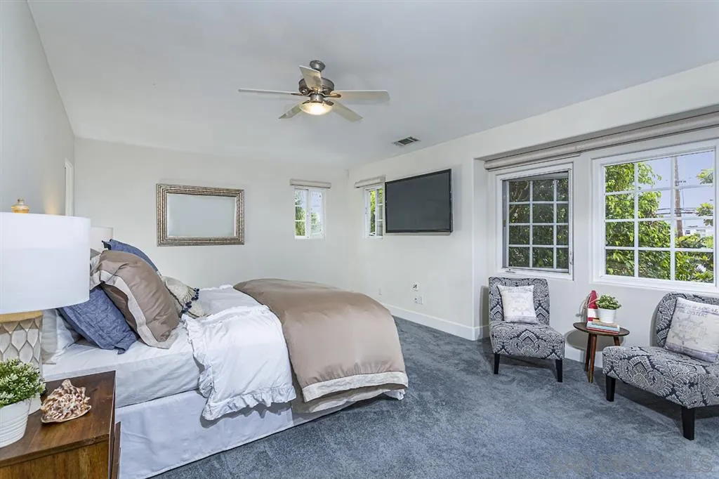 930 10th Street Coronado, CA 92118 - Photo 8 of 25 a bedroom with bed and a window