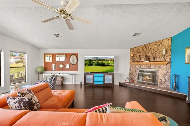 a kitchen with stainless steel appliances a refrigerator and a stove
