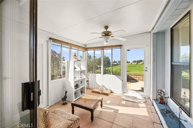 a kitchen with sink and cabinets