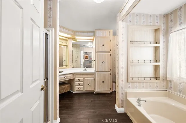 a view of a swimming pool and an outdoor seating