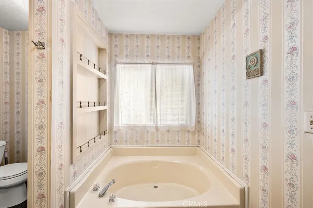 an aerial view of a house with a ocean view