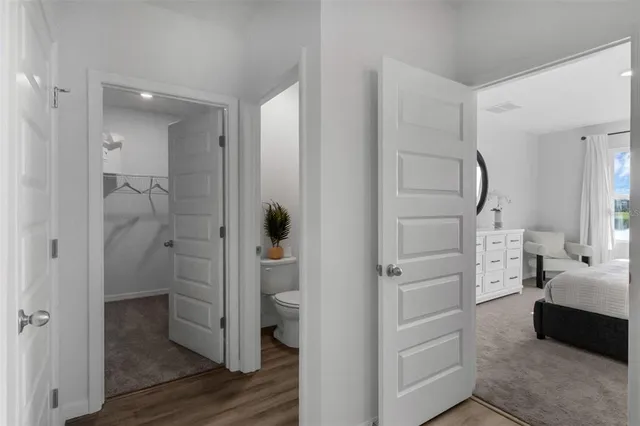 a bathroom with a shower and a sink