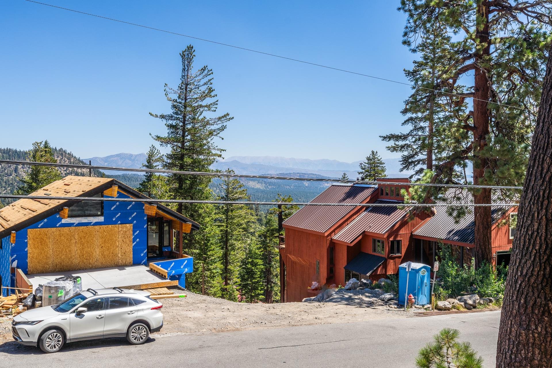 381 John Muir Road Mammoth Lakes, CA 93546 - Photo 17 of 23 a car parked in front of a house