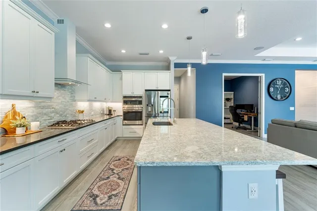 a workspace with furniture and a window