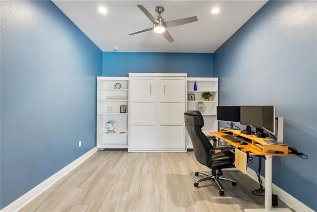 a view of a tree in a yard