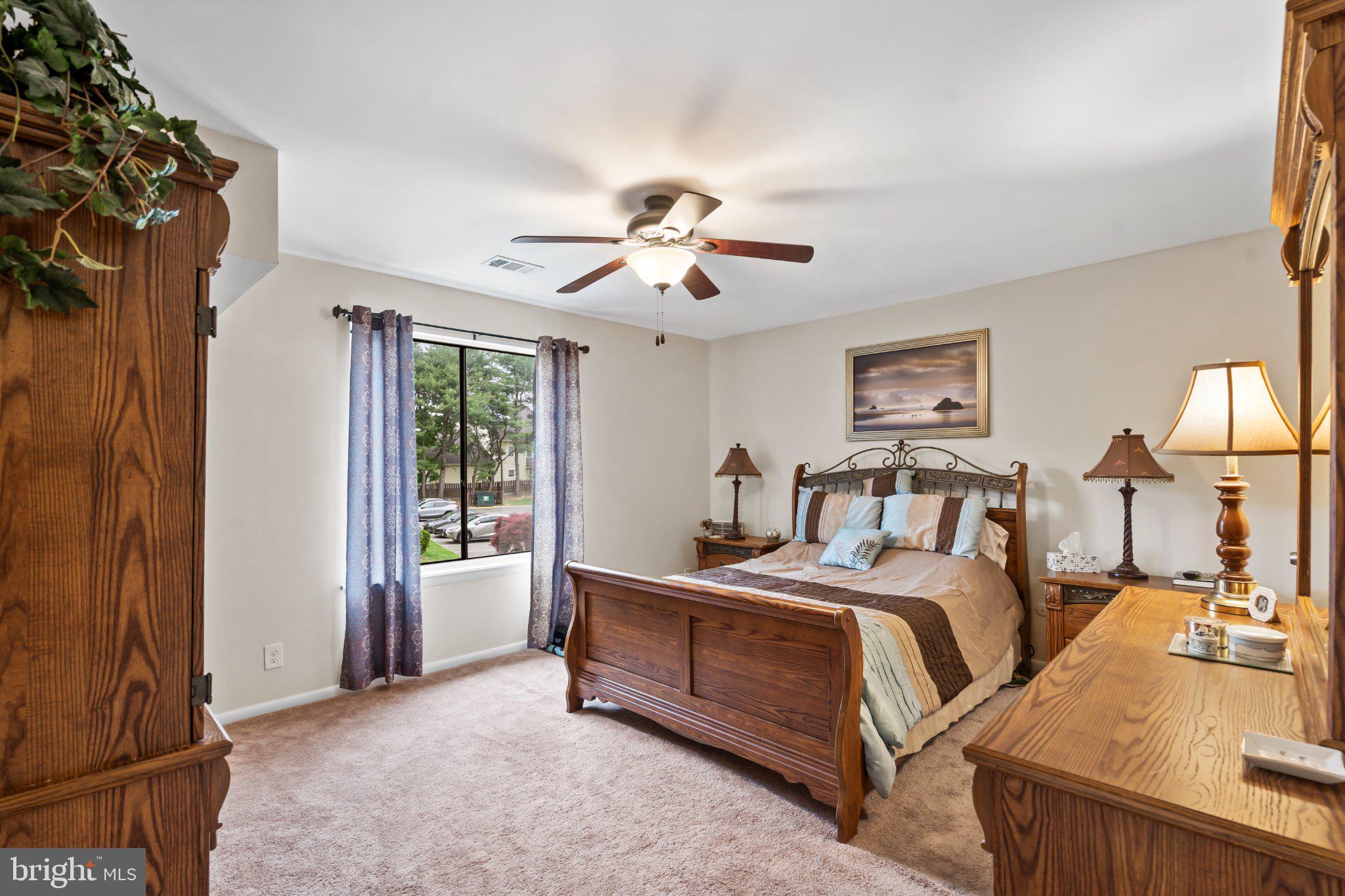 1475 Mt Holly Road, Unit F2 Edgewater Park, NJ 08010 - Photo 19 of 33 Serene bedroom with natural light.
