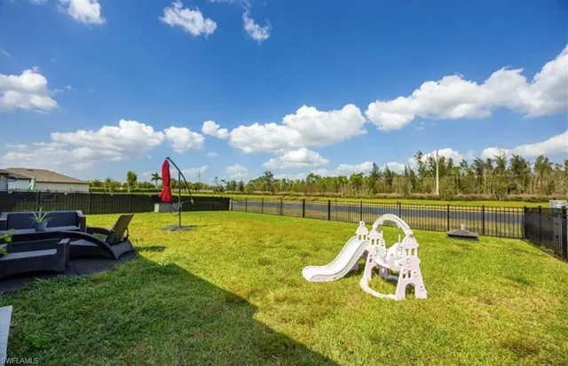 a view of a lake with a slide