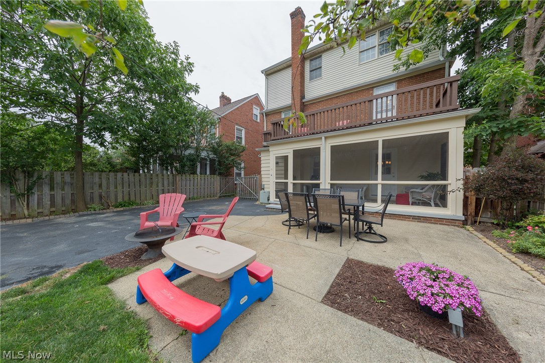 2465 Traymore Road Cleveland, OH 44118 - Photo 32 of 34 The concrete patio and showing the rear porch and upper deck