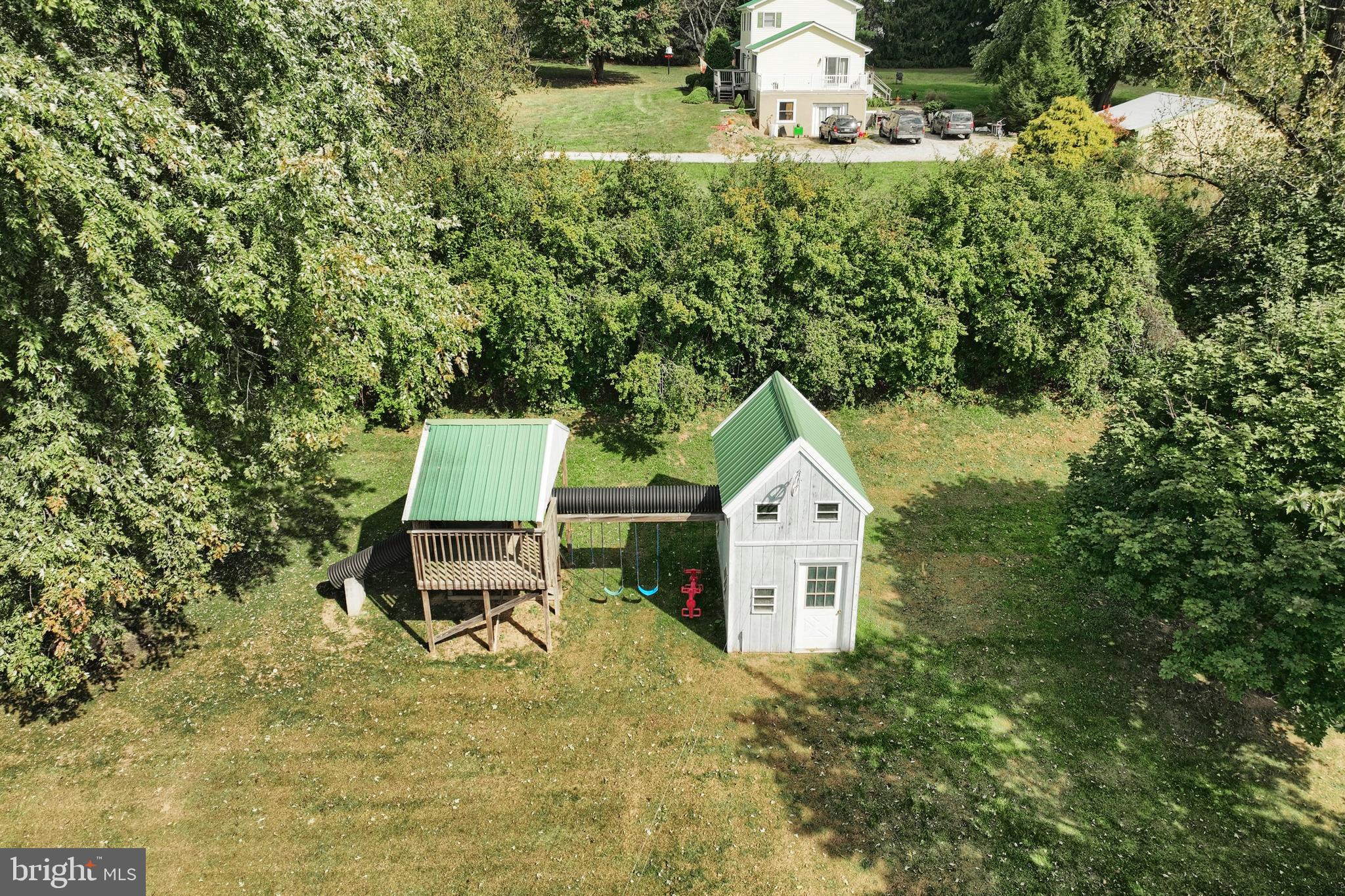 61 West McKinley Road Delta, PA 17314 - Photo 11 of 94 a view of a house with a yard and sitting area