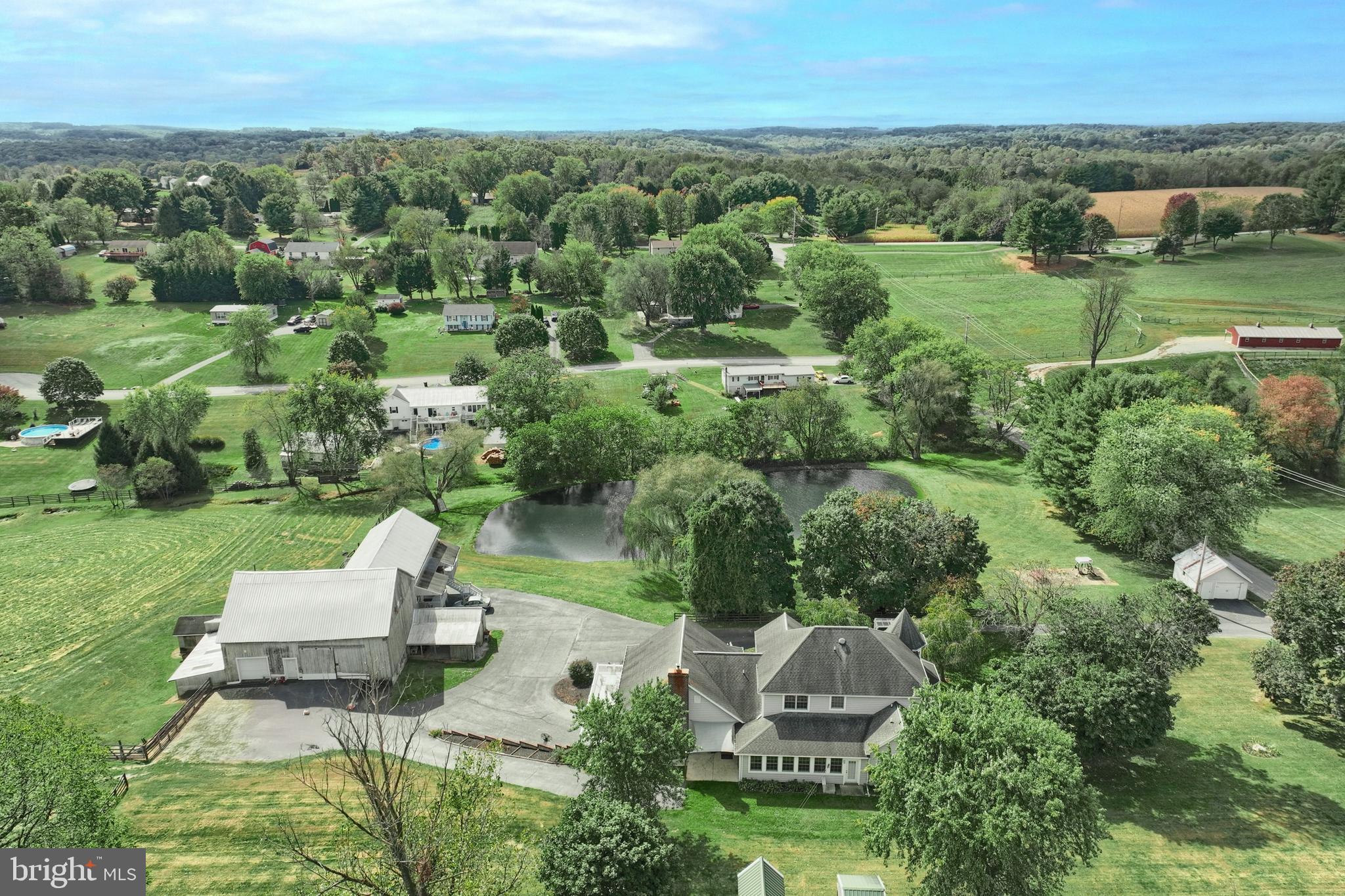 61 West McKinley Road Delta, PA 17314 - Photo 13 of 94 an aerial view of a house with yard and lake view