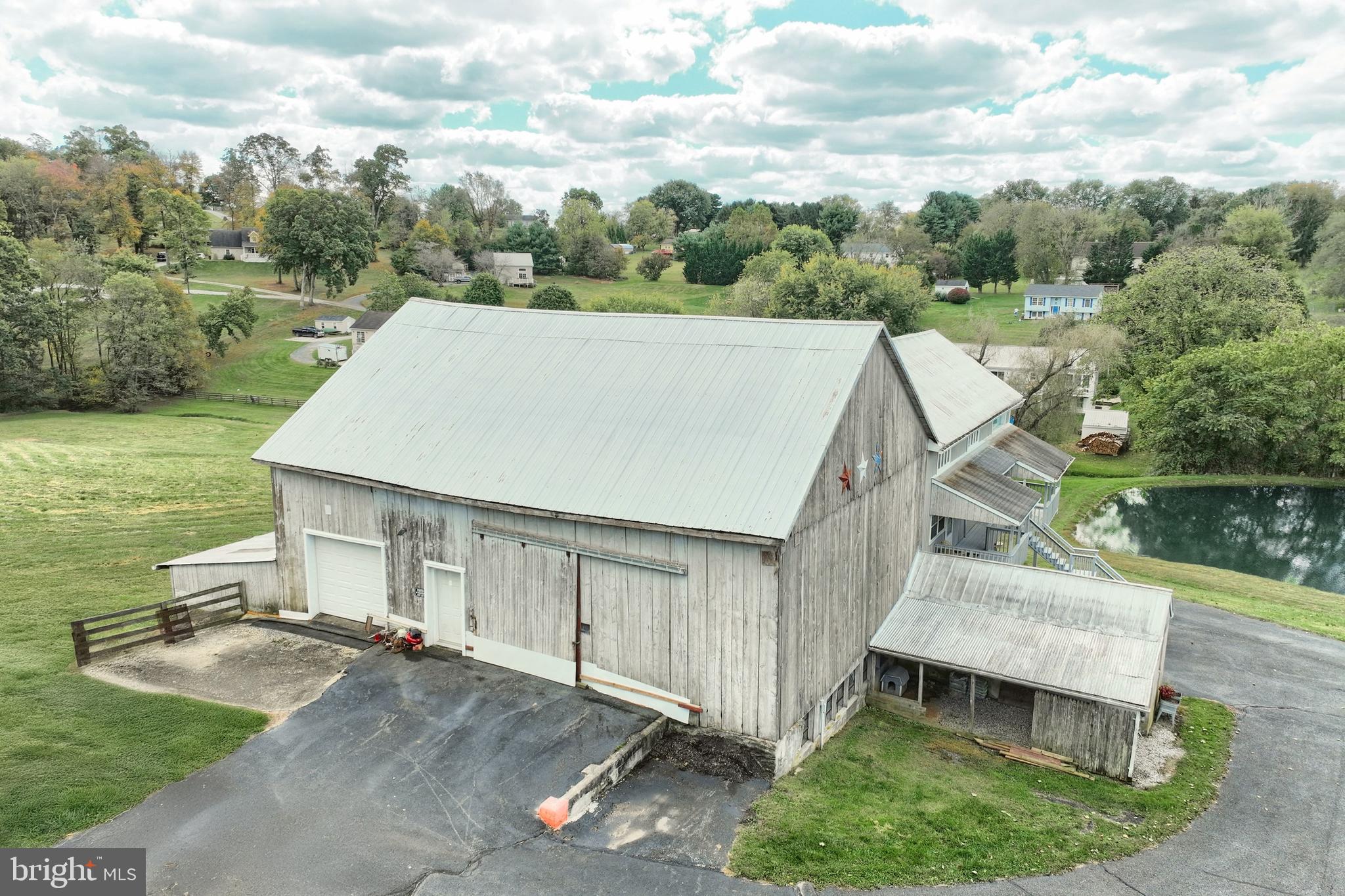 61 West McKinley Road Delta, PA 17314 - Photo 24 of 94 an aerial view of a house having yard