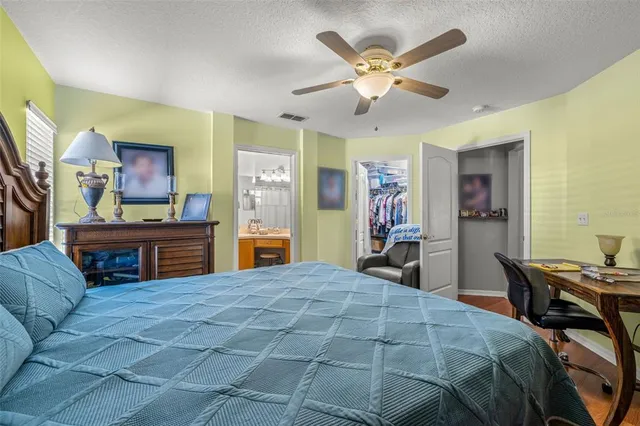 a bathroom with a sink toilet and a mirror