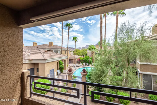 a view of a street from a balcony